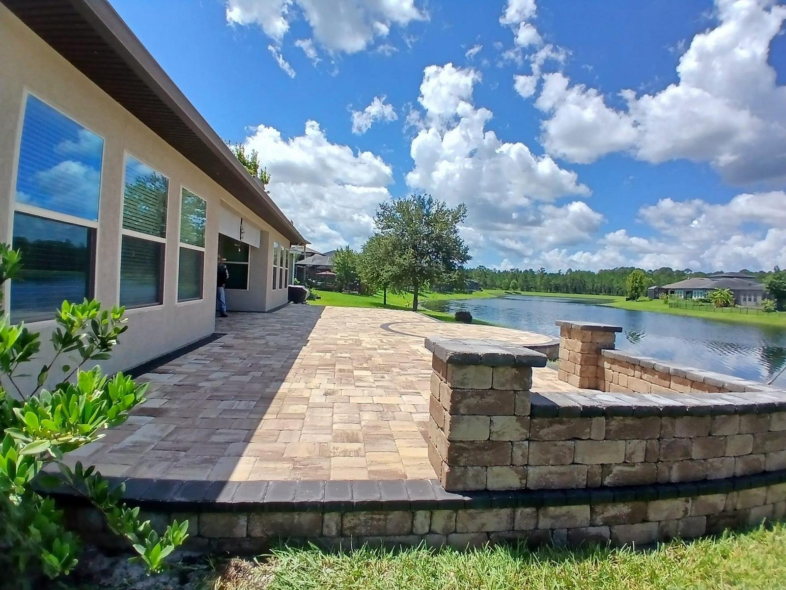 Beautiful pool deck with retaining wall